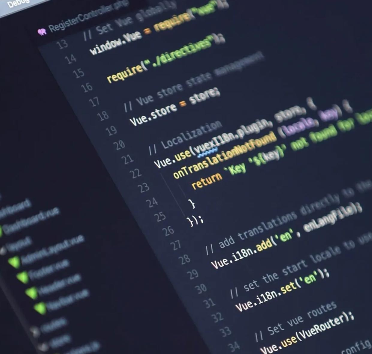 A close up of Vue JS development code on a computer monitor.